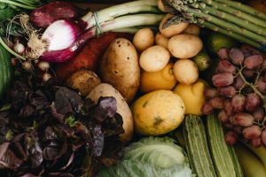 Farm-based produce aging naturally with intact texture and colour compared to rapidly spoiling industrial food.